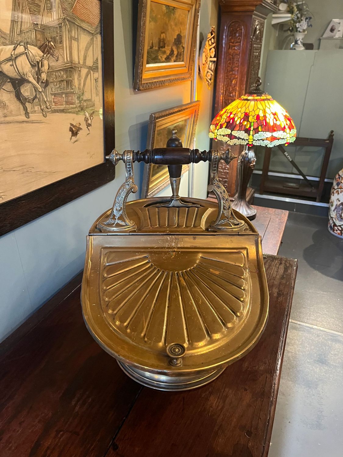 Antique brass helmet coal scuttle with matching shovel and darkwood handles