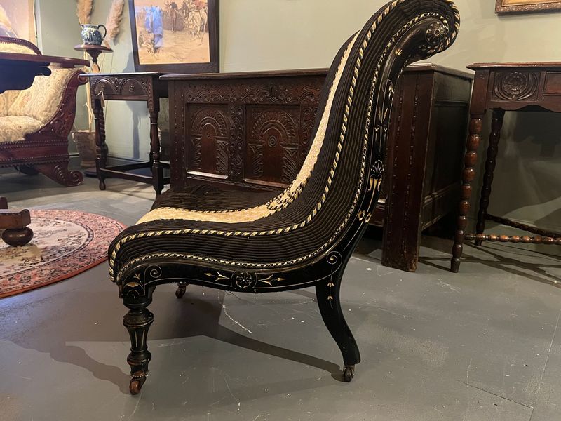 Victorian slipper chair with black and gold upholstery