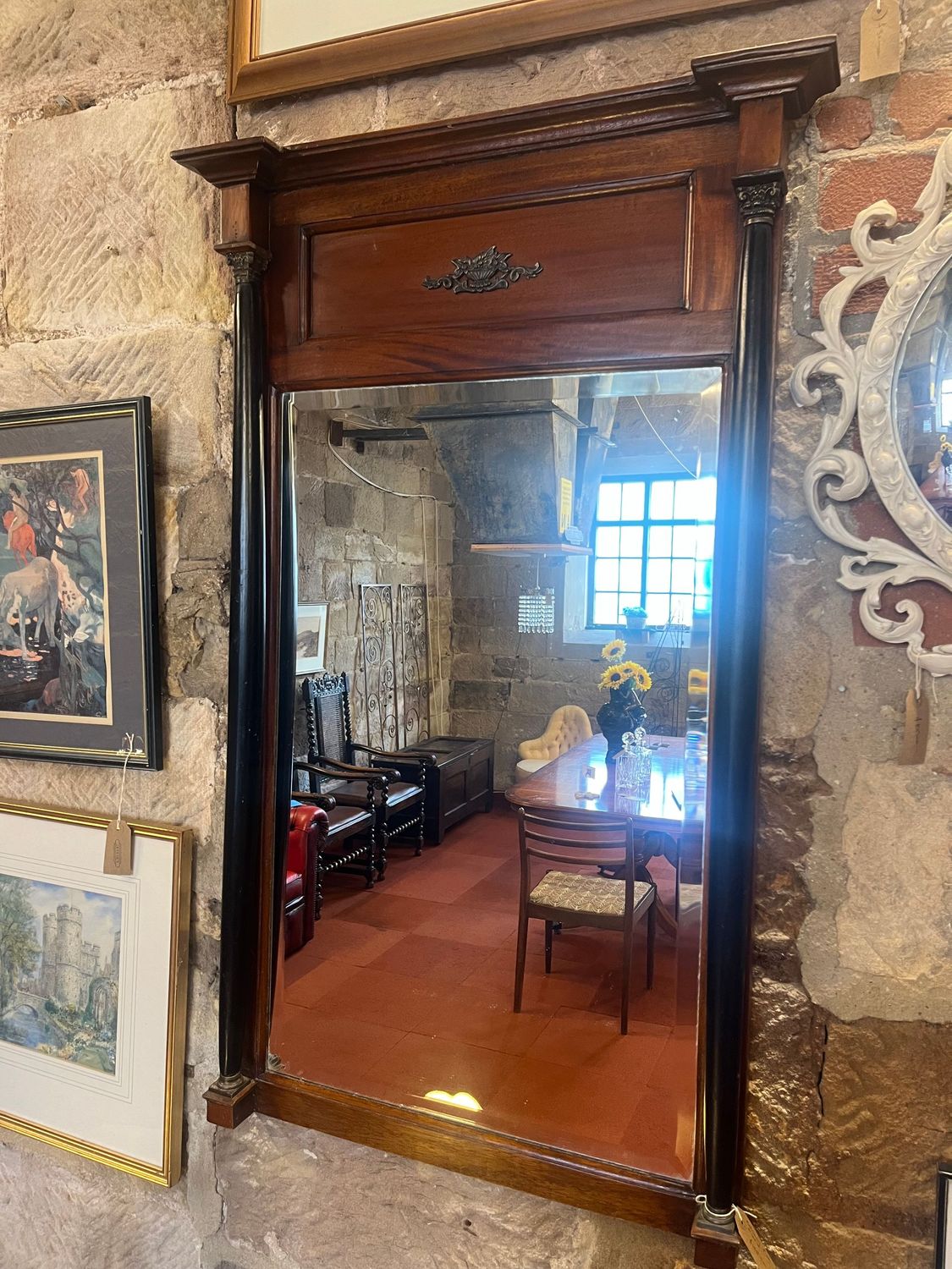 Mahogany and Ebonised Pier Mirror Architectural wall mirror with ebonised side columns, projecting cornice and decorative wooden frieze
