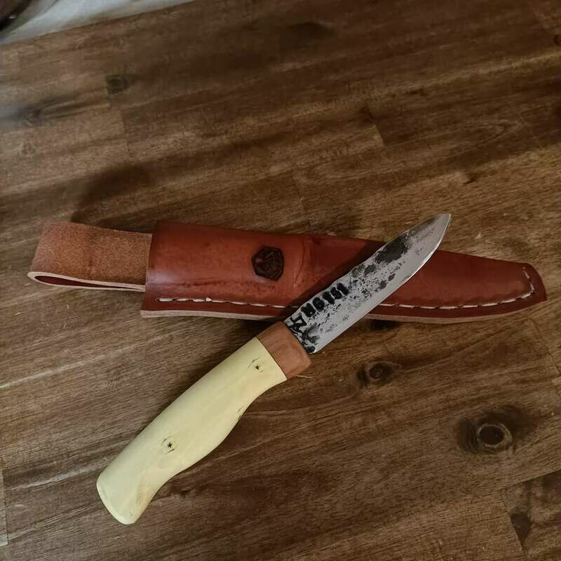 Outdoor knife with a blade from the MG 151 (on-board gun for German fighter pilots). Handle made from 30,000 year old deer antlers and sloe. Outdoor knife with a blade from the MG 151 (on-board gun for German fighter pilots). Handle made from 30,000 year old deer antlers and sloe.
