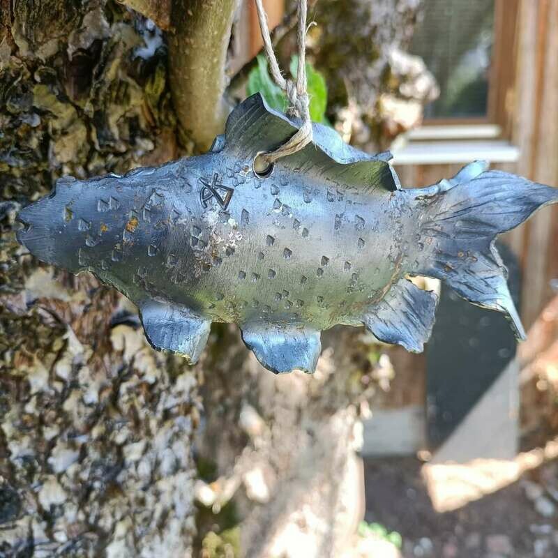 Hand-forged goldfish made of iron. Untreated Hand-forged goldfish made of iron. Untreated