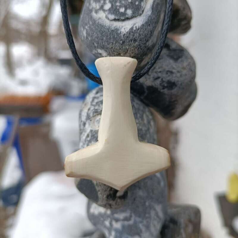 Stylized hammer from Jacutian mammoth ivory Stylized hammer from Jacutian mammoth ivory