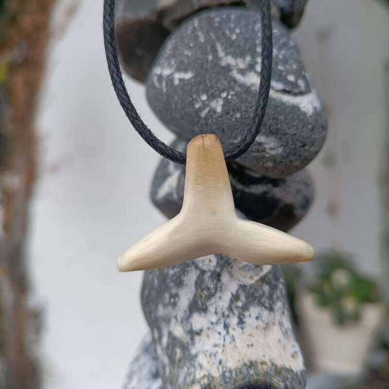 Stylized shark fin from Jacutian mammoth ivory Stylized shark fin from Jacutian mammoth ivory