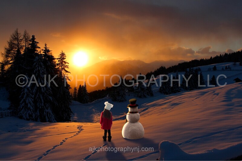 Snowman and child in sunset digital backdrop Snowman and child in sunset digital backdrop