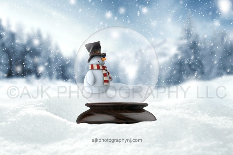 Snowman in snow globe in field of snow digital background