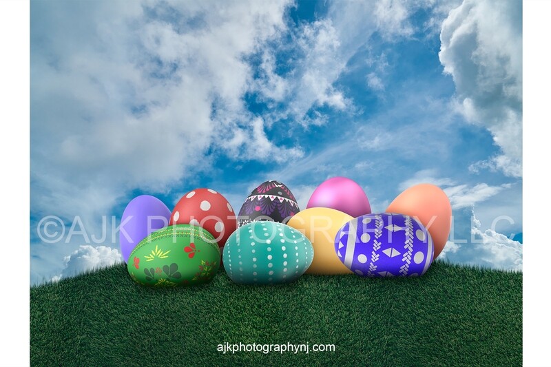 Giant Easter eggs in a field of grass digital backdrop.