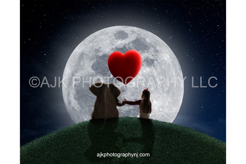 Valentines Day digital background, an elephant sitting on a grassy hill holding a red heart shaped balloon in front of a large moon digital backdrop Valentines Day digital background, an elephant sitting on a grassy hill holding a red heart shaped balloon in front of a large moon digital backdrop