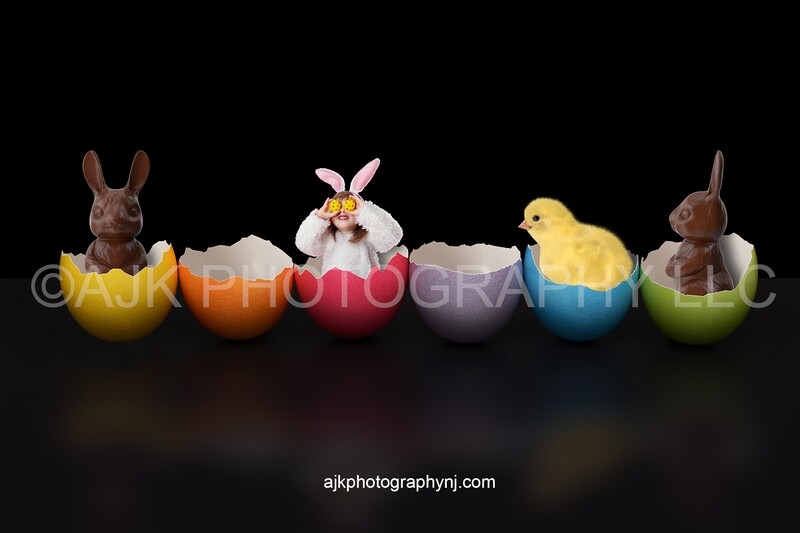 Easter digital background, chocolate bunnies and yellow chick inside cracked colored Easter eggs, black background, digital backdrop