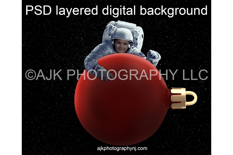 Christmas digital background, one astronaut in outer space holding a giant Christmas ornament, digital backdrop