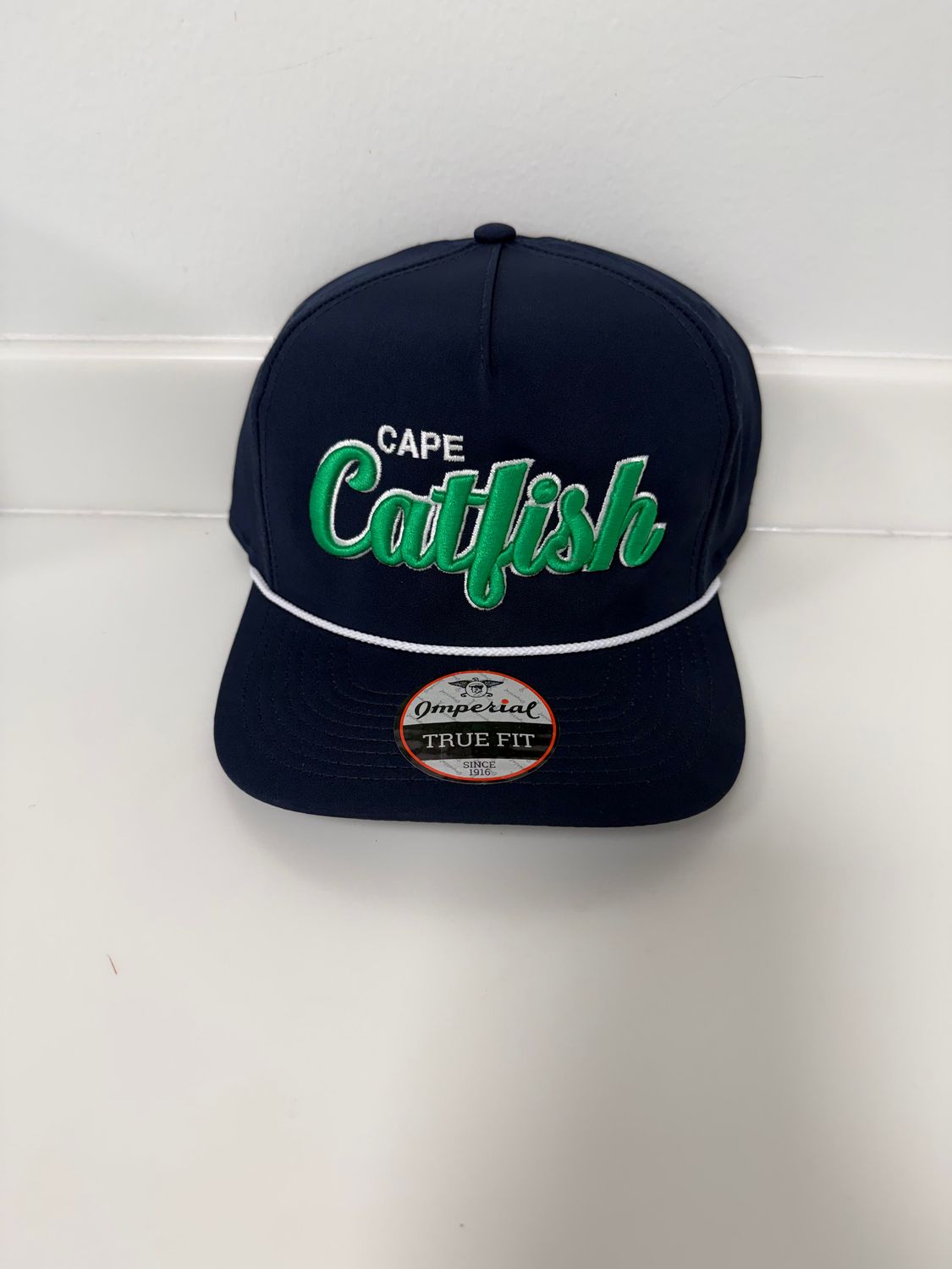 Richardson 258 Black Hat with Green Script and White Rope Richardson 258 Black Hat with Green Script and White Rope