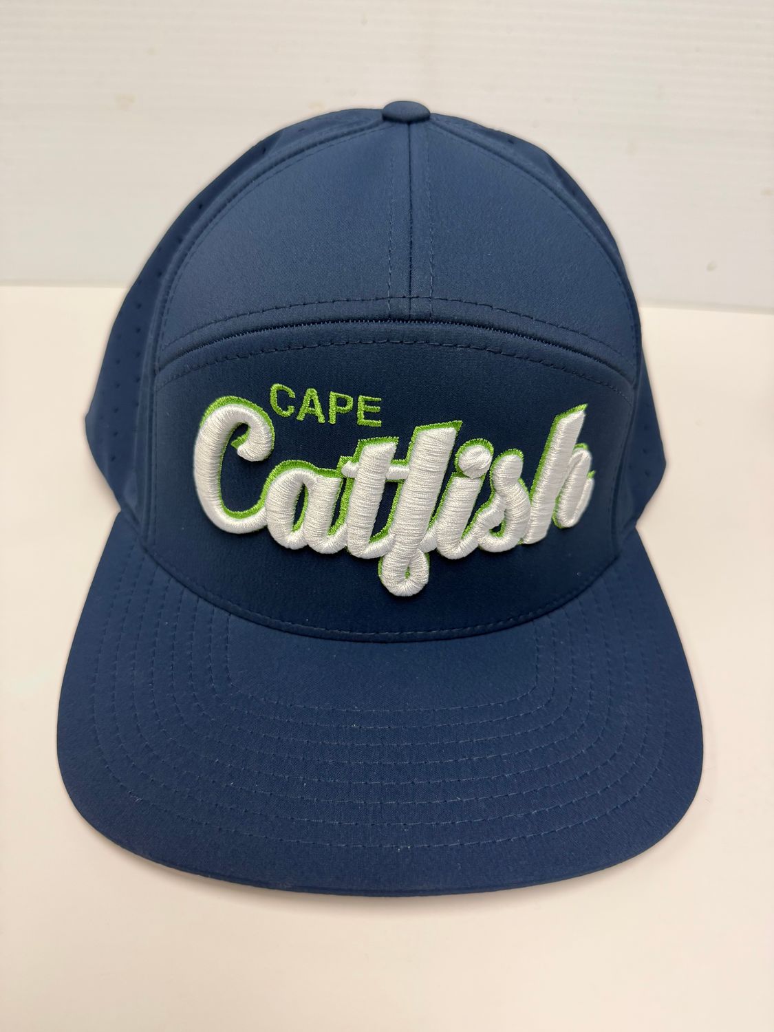 Richardson 7 Panel Navy Hat with Neon Green Outline Richardson 7 Panel Navy Hat with Neon Green Outline