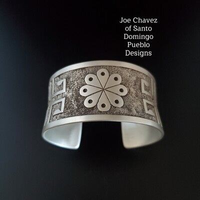 Sterling silver Overlay cuff with texturing and Pueblo symbols 