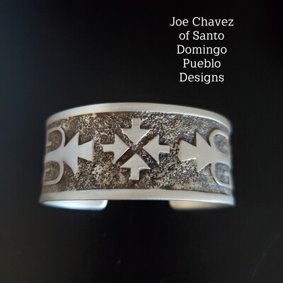 Sterling silver overlay cuff with traditional Pueblo corn & 4 direction symbols 