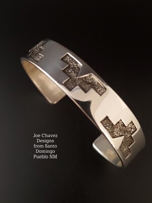 Sterling silver "Overlay " cuff with "Kiva steps" symbols Sterling silver "Overlay " cuff with "Kiva steps" symbols