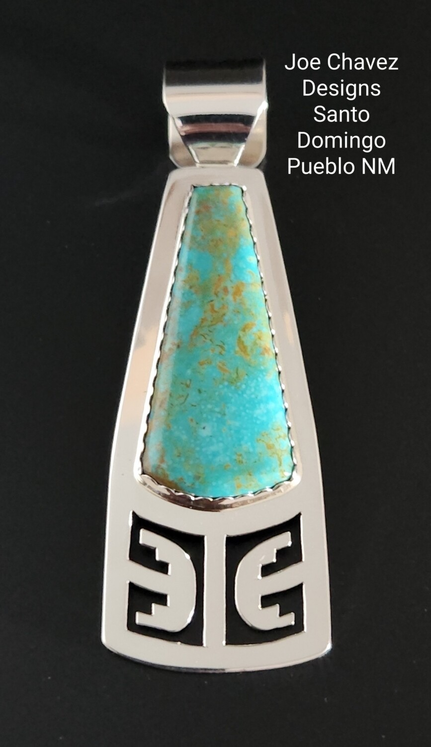 Sterling silver pendant with Kingman turquoise stone &traditional Pueblo symbols