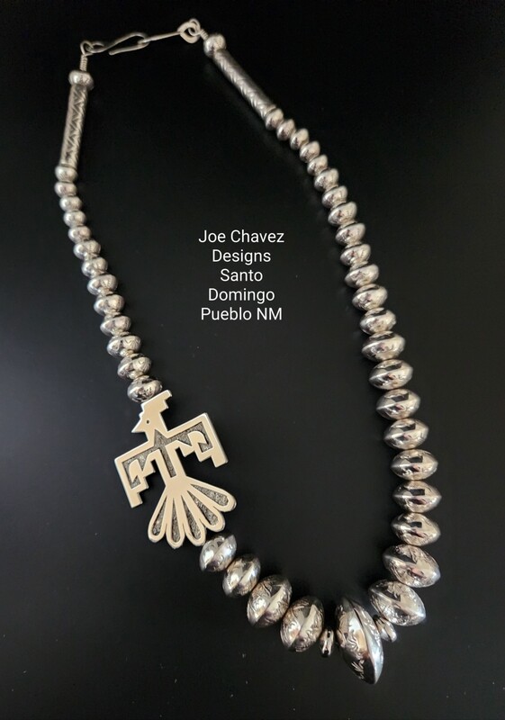 HANDMADE Sterling silver beads with Overlay Thunderbird pendant attached.