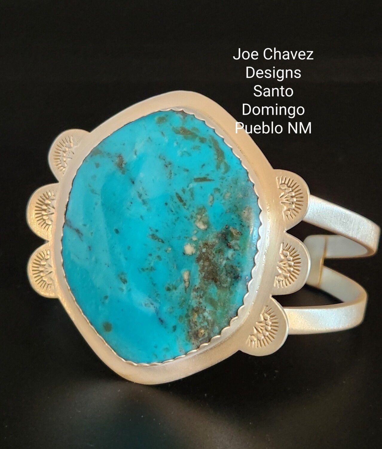 Sterling silver bracelet with a large beautiful Kingman turquoise