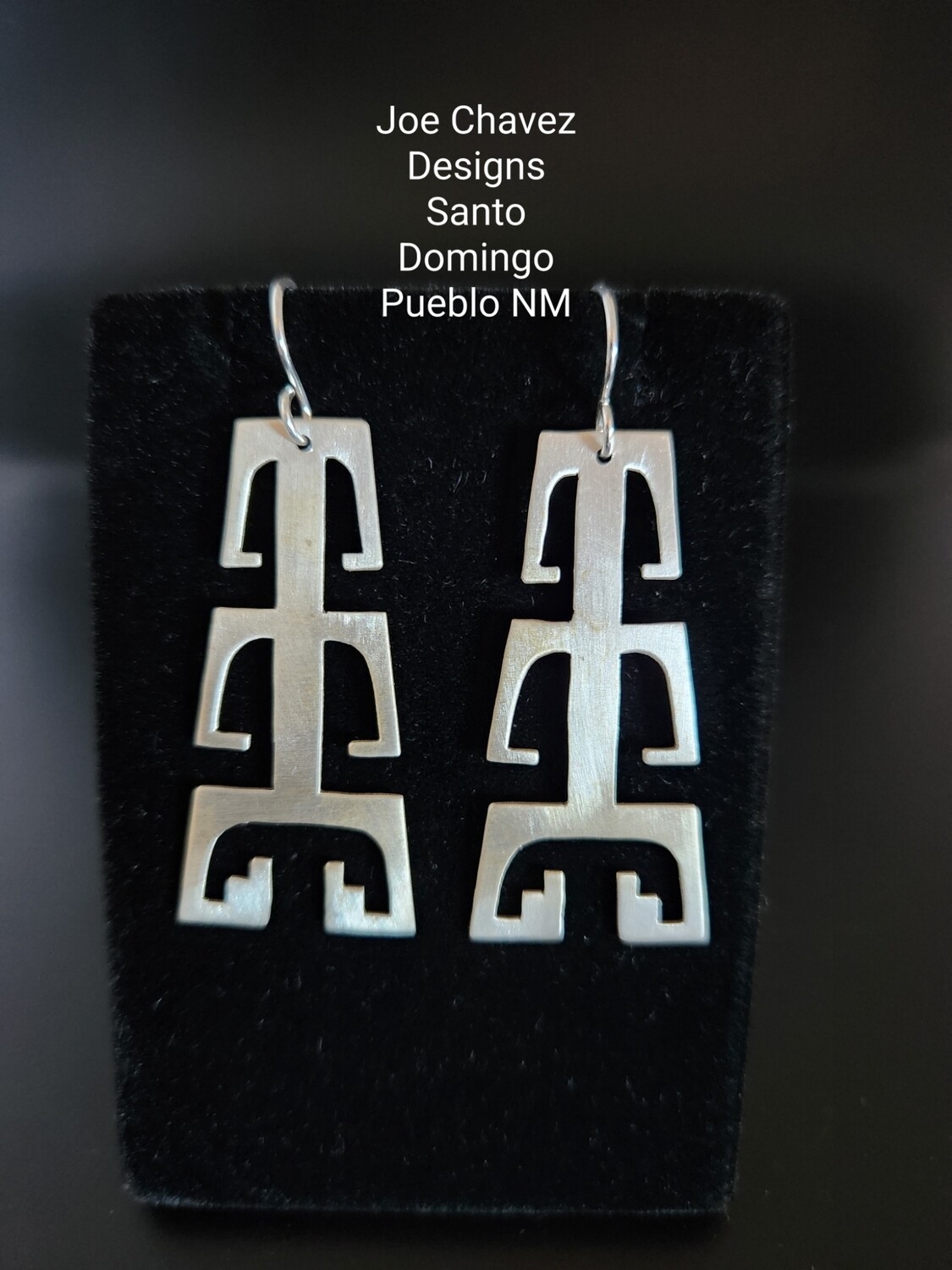 Sterling silver cutout earrings with traditional Pueblo Corn symbol