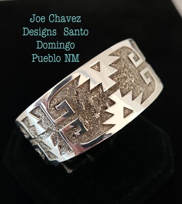 Sterling silver OVERLAY cuff with traditional Pueblo symbols