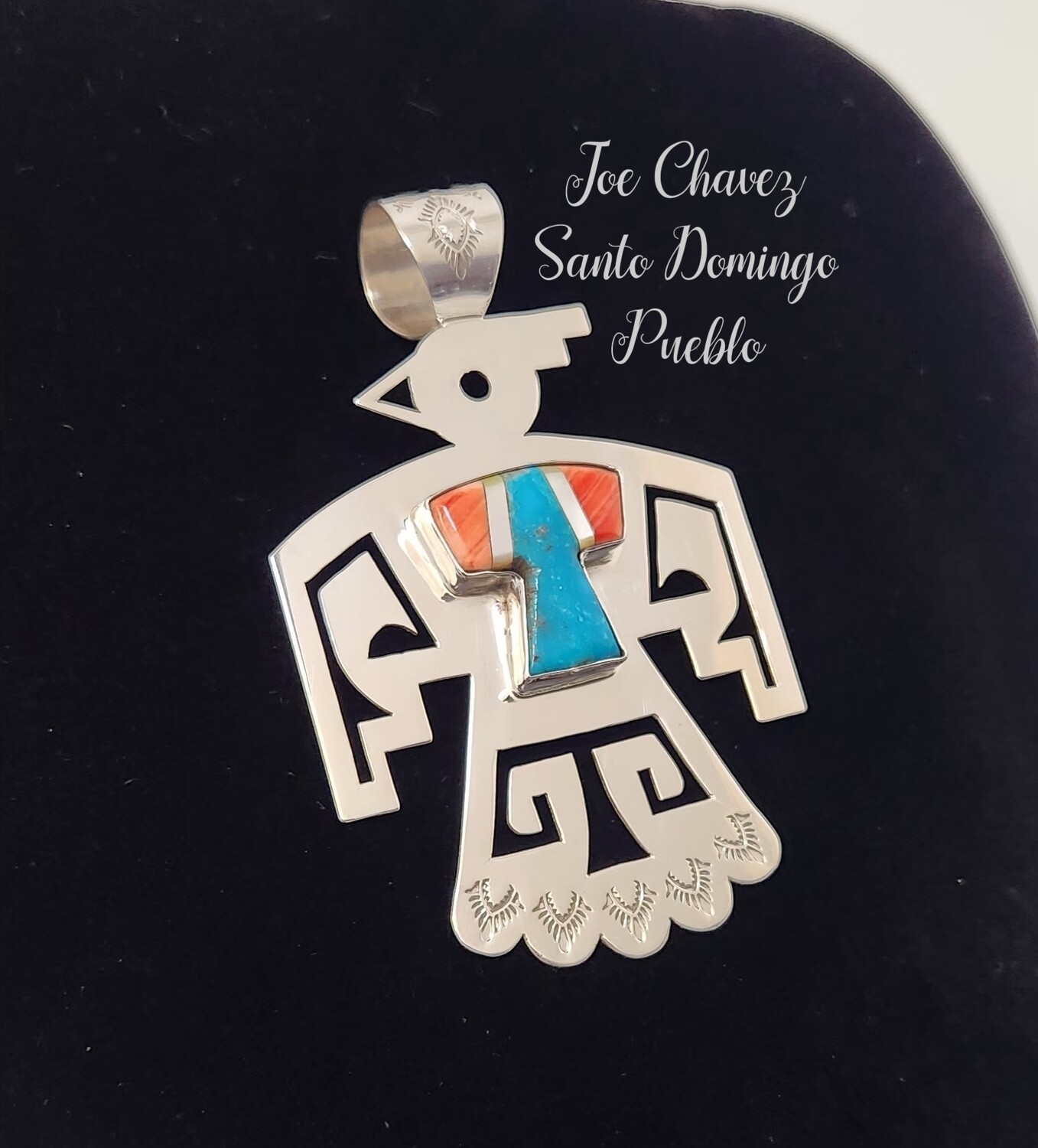 Sterling silver Santo Domingo Pueblo Thunderbird pendant with Inlayed stones
