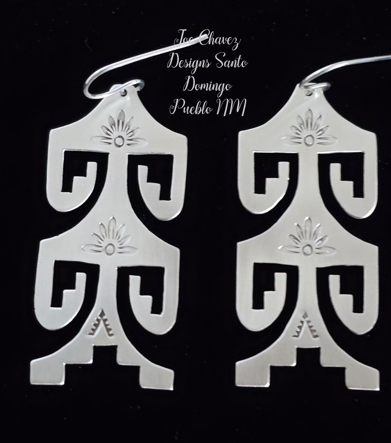 Sterling silver Earrings with traditional Pueblo geometric symbols