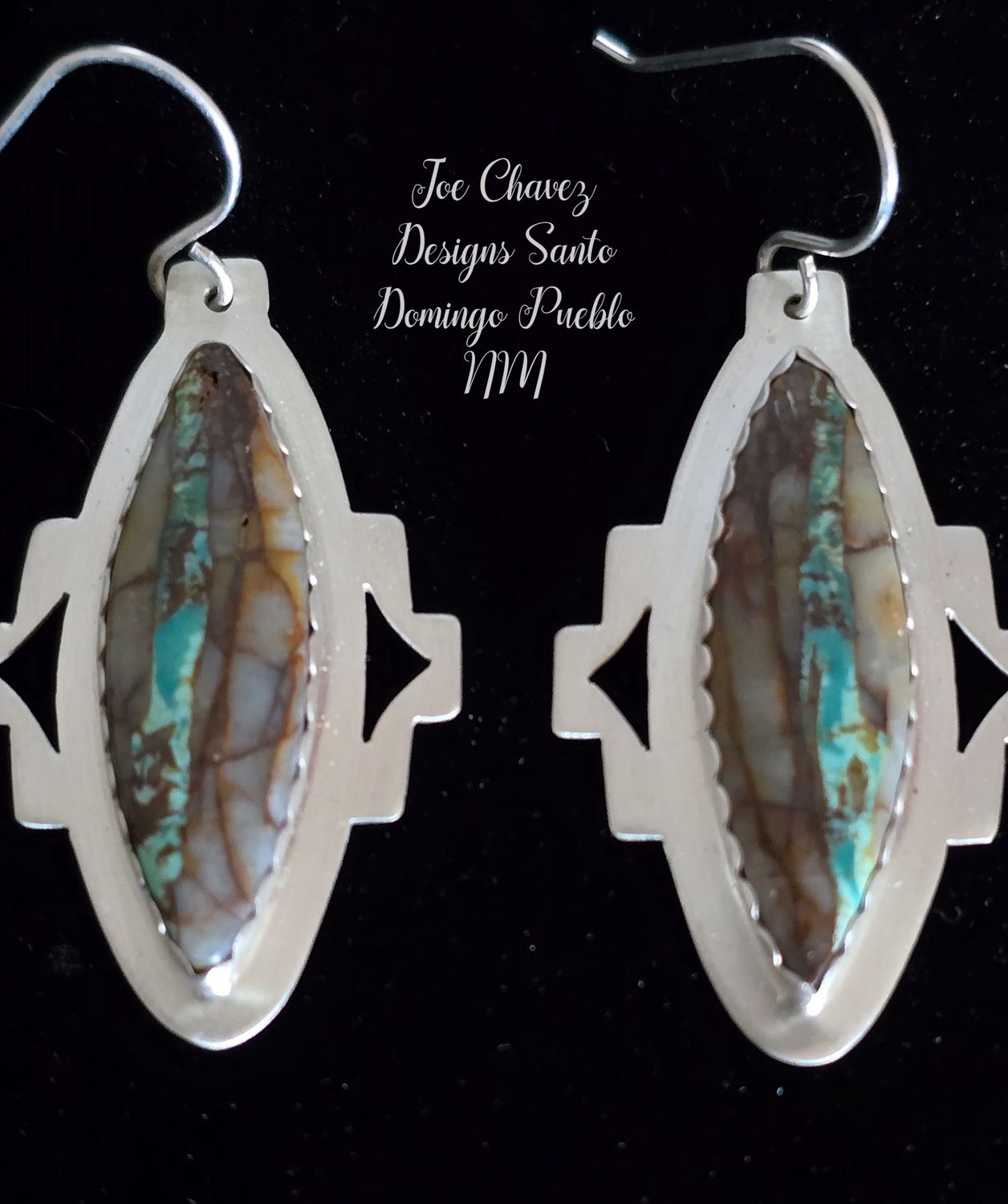 Sterling silver earrings with Royston Ribbon turquoise stones.