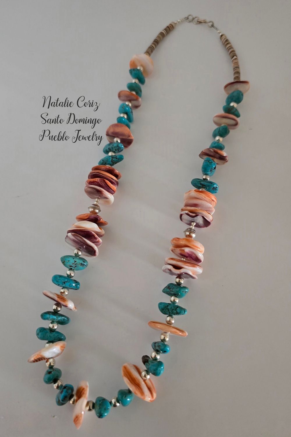 Classic Santo Domingo Pueblo Turquoise Nuggets and Lions Paw shell necklace