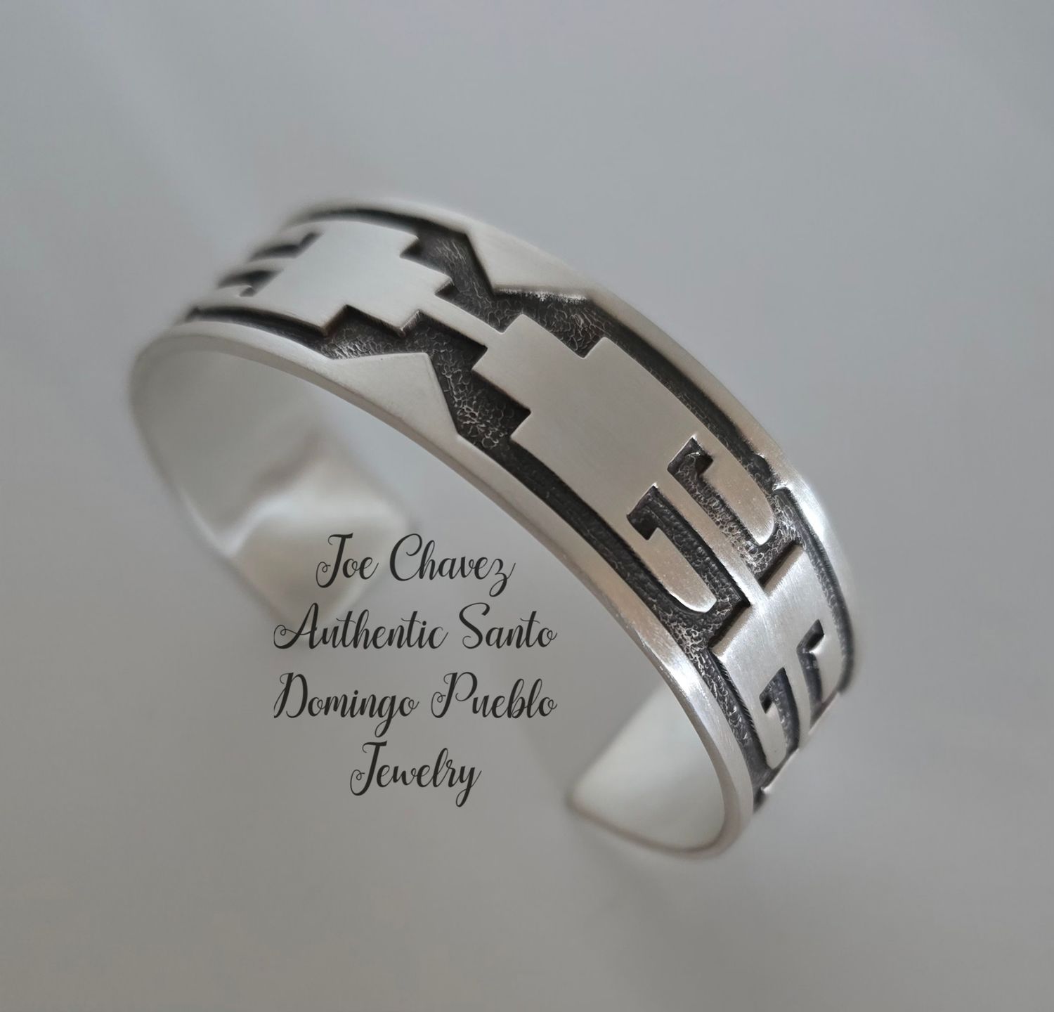 Sterling silver &quot;OVERLAY&quot; cuff with traditional Pueblo symbols