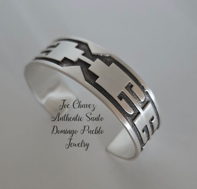 Sterling silver &quot;OVERLAY&quot; cuff with traditional Pueblo symbols