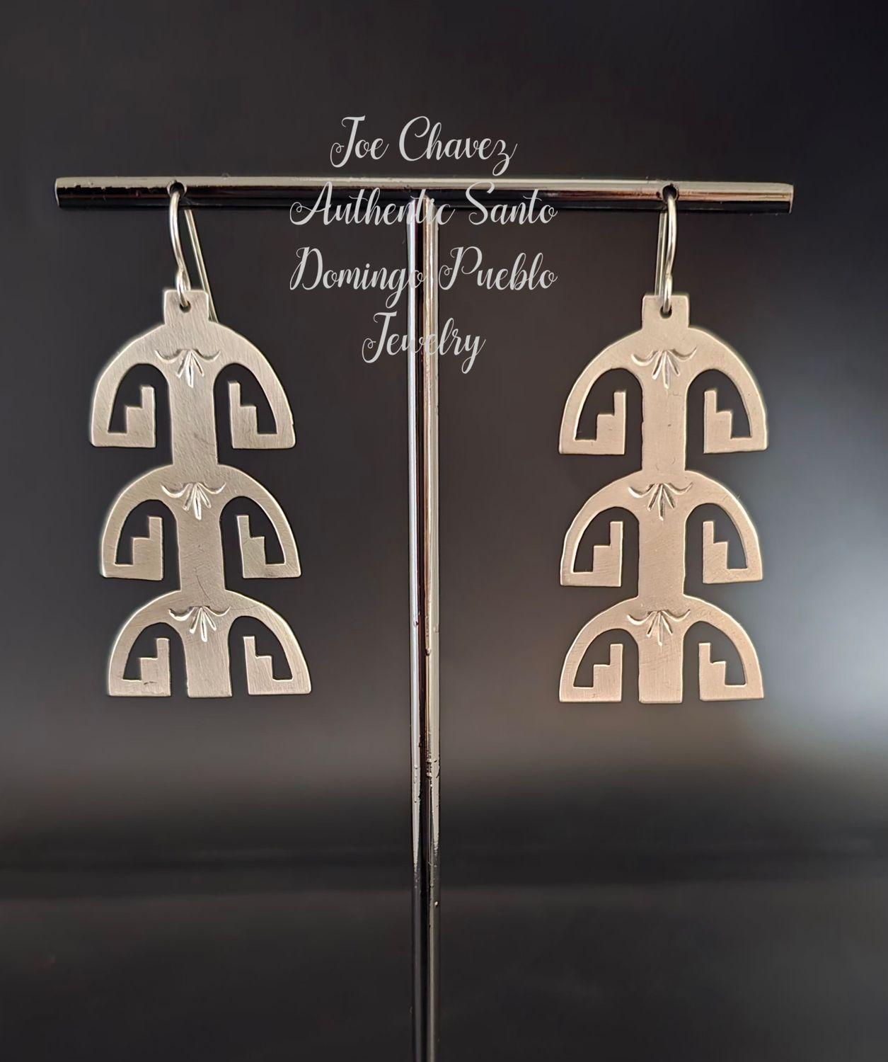 Sterling silver brushed finish polish cutout earrings with Pueblo symbols