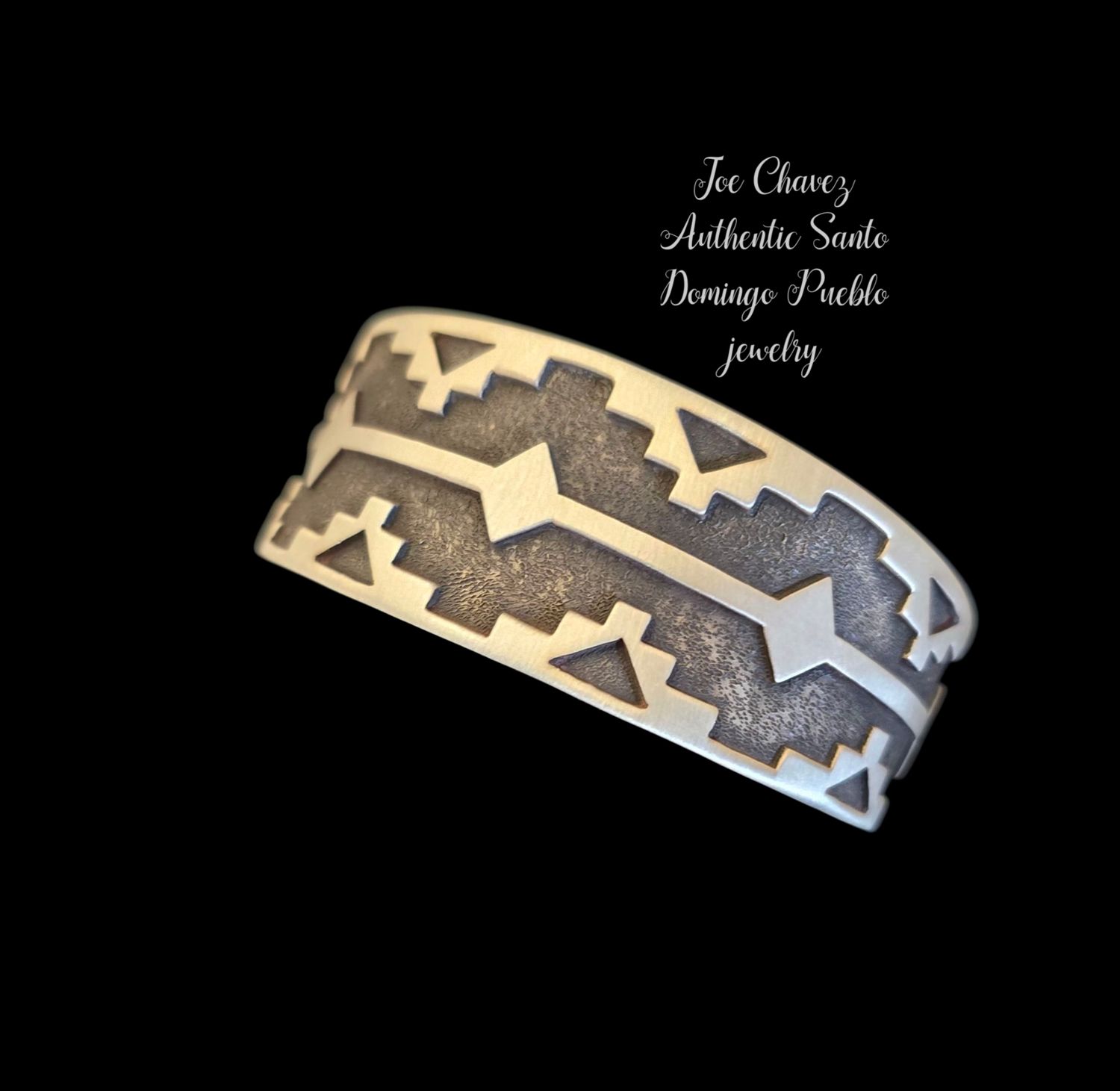 Sterling silver Overlay cuff with traditional Pueblo symbols