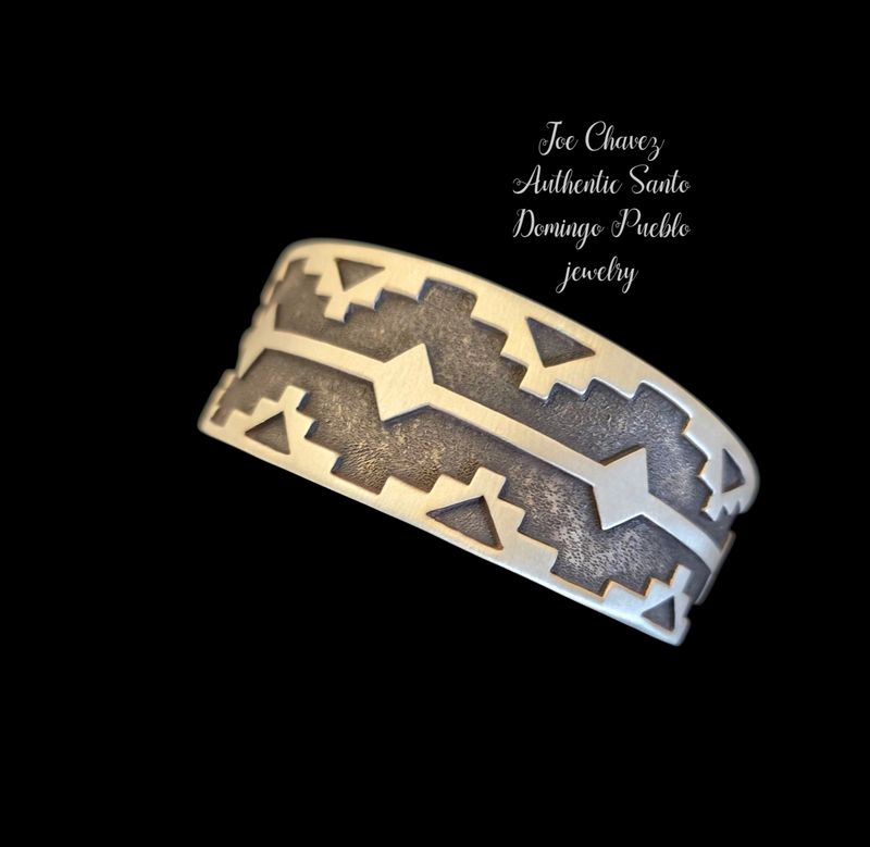 Sterling silver Overlay cuff with traditional Pueblo symbols