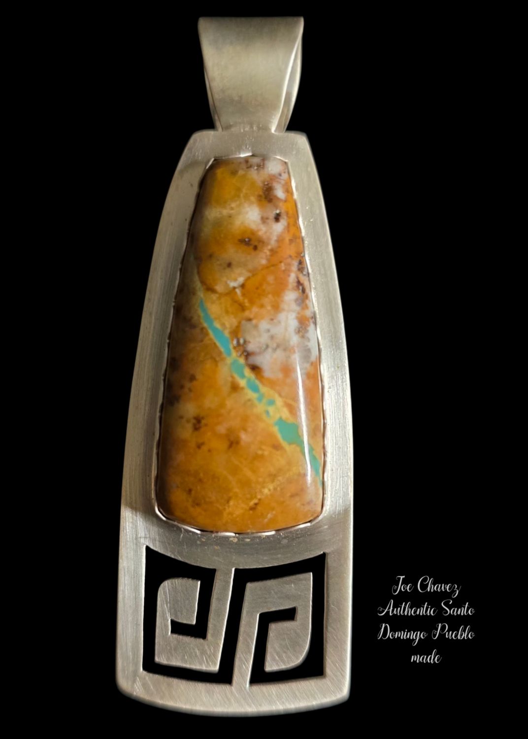 Sterling silver Pendent with Royston Ribbon Turquoise stone.