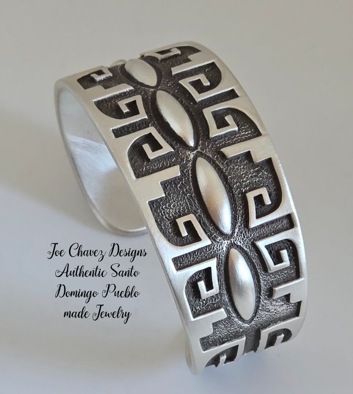 Sterling silver Overlay &amp; Repoussé cuff with traditional Pueblo symbols