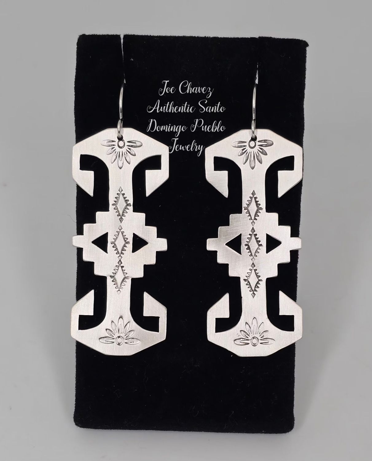 Sterling silver "cutout" brushed finish earrings with Pueblo symbols