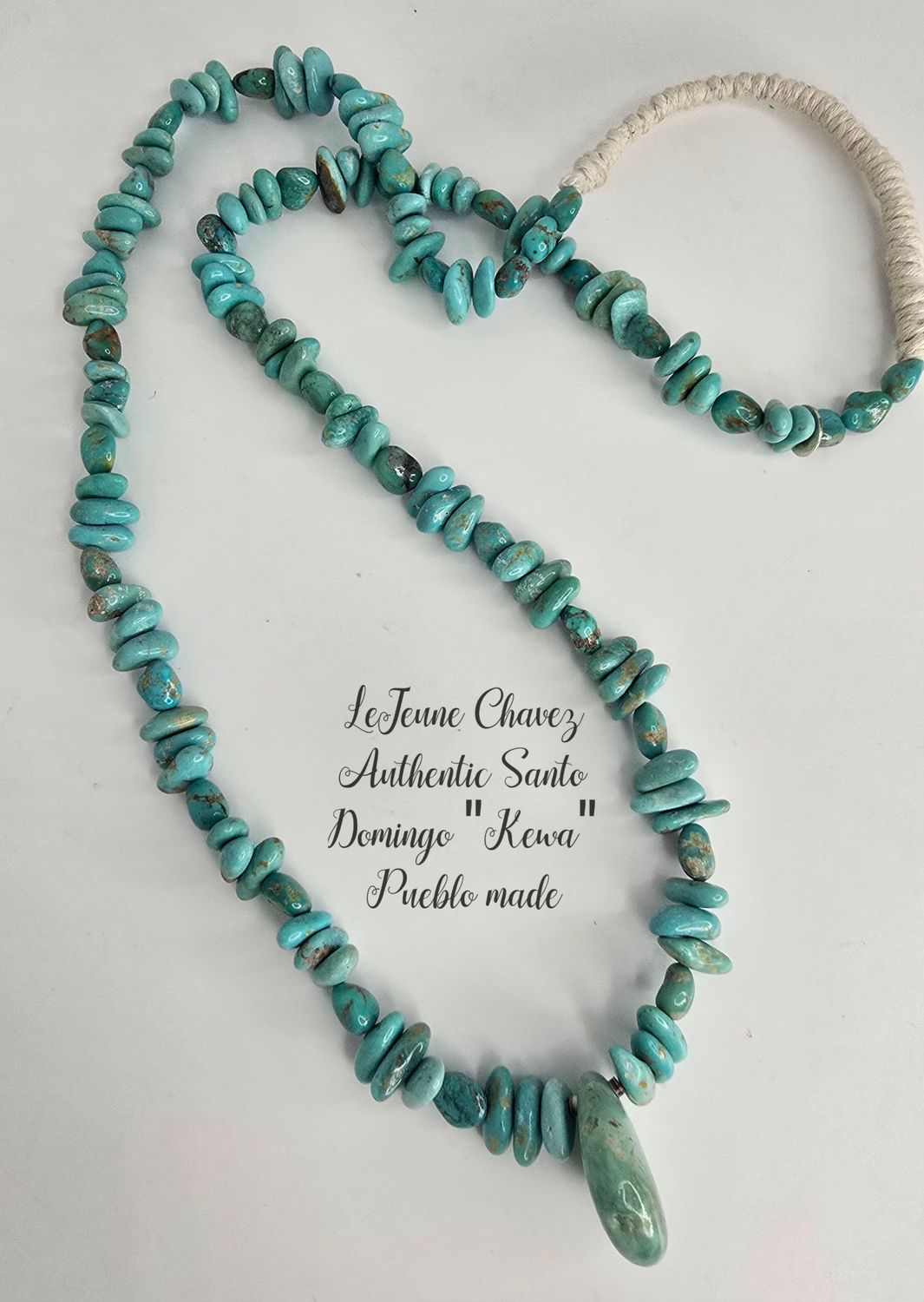 Classic and authentic Santo Domingo Pueblo made turquoise stone necklace with wrapped tie on end