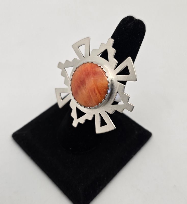 Brushed finished sterling silver adjustable ring with natural Spiney Oyster shell