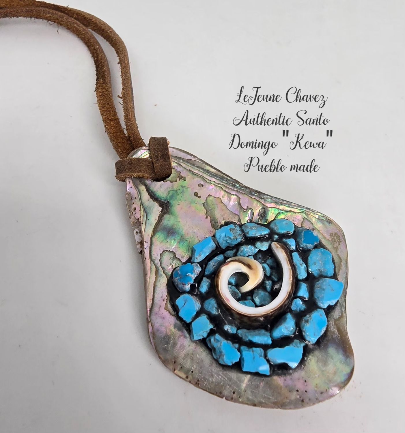 "CHACO SERIES COLLECTION" Inlaid circle of life symbol with Kingman turquoise stones and heishi shell. Inlaid on abalone shell.