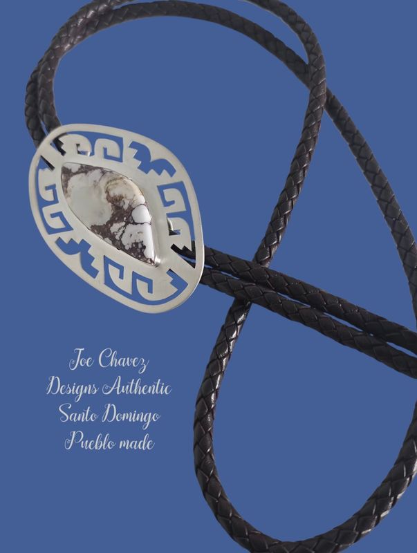 Brushed sterling silver bolo tie with natural Wildhorse stone and traditional Pueblo symbols