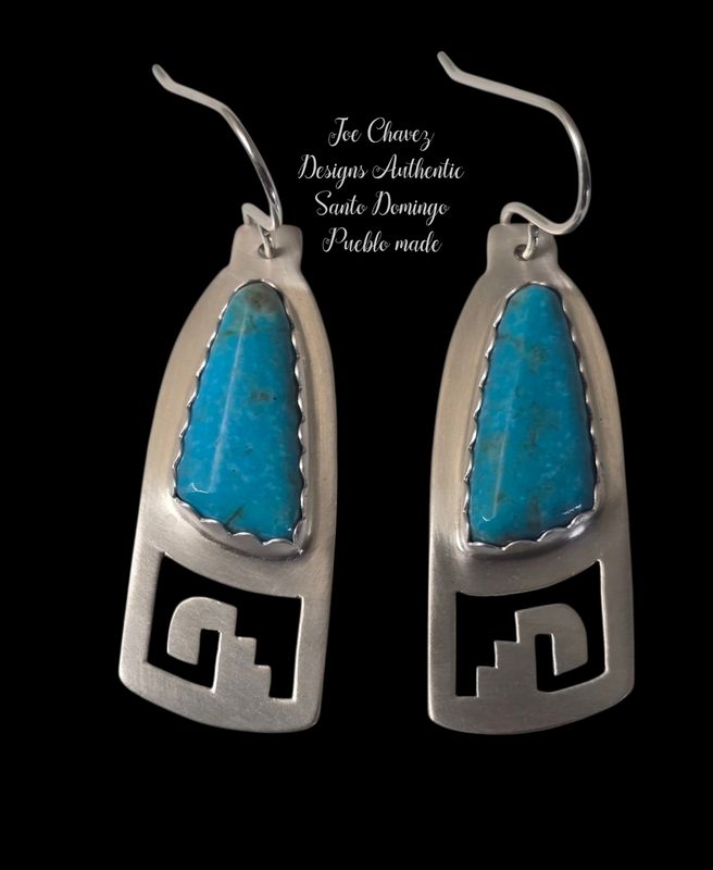 Sterling silver earrings with Kingman turquoise and traditional Pueblo symbols