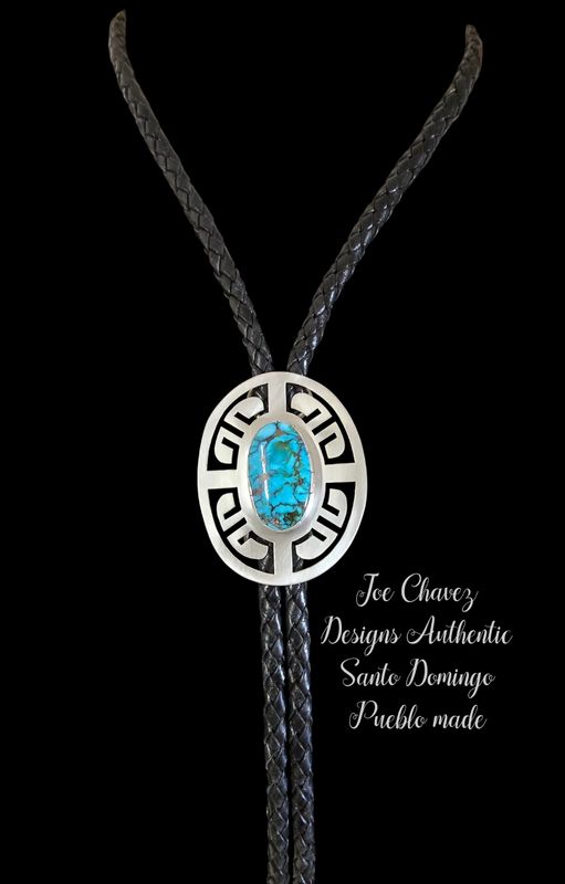 Sterling silver Bolo with high-quality Kingman turquoise stone. Traditional Pueblo symbols