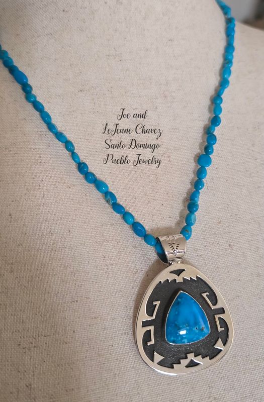Triple A Ithaca Peak turquoise with Sterling silver Overlay Pendent