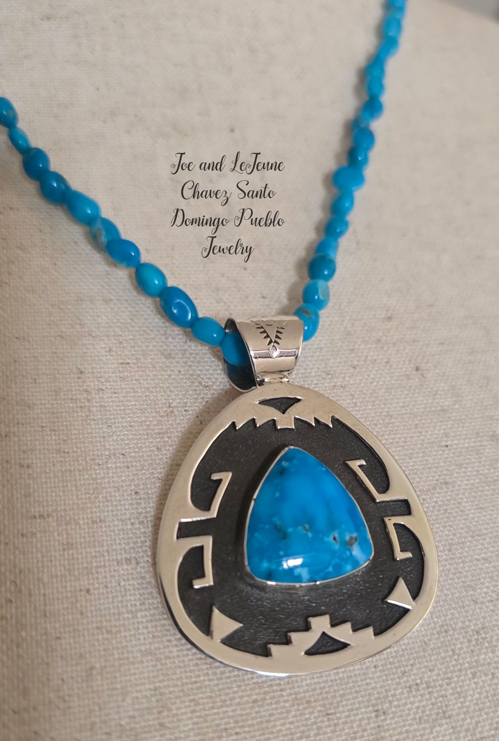 Triple A Ithaca Peak turquoise with Sterling silver Overlay Pendent