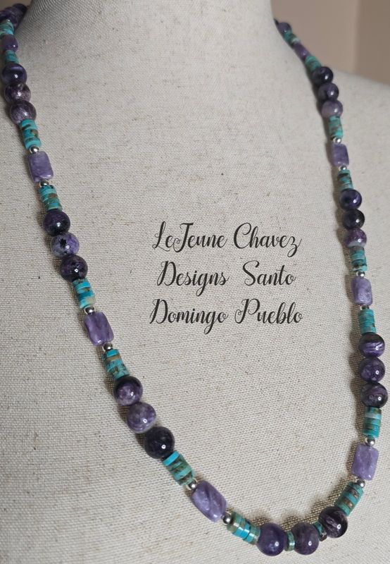 Kingman turquoise and natural Charoite stones with sterling silver beads.
