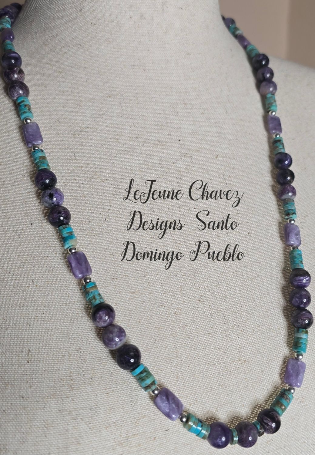 Kingman turquoise and natural Charoite stones with sterling silver beads.