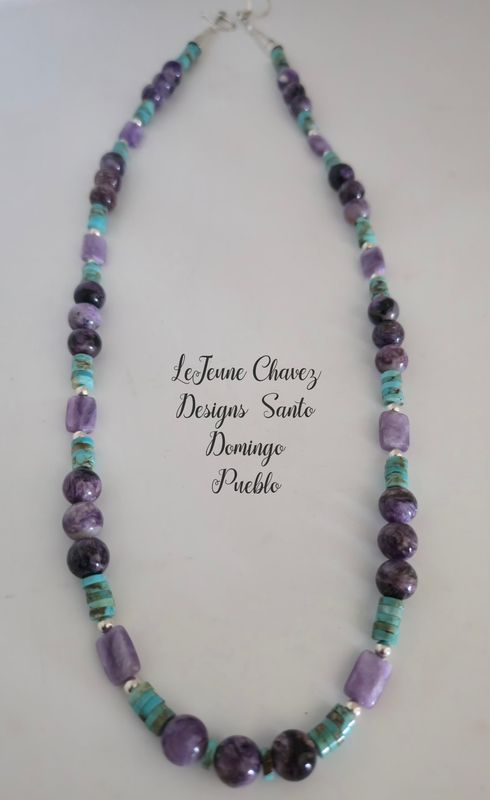 Kingman turquoise and natural Charoite stones with sterling silver beads.