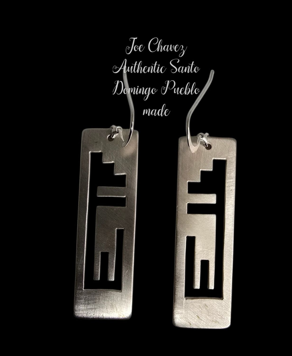 Sterling silver brushed finish earrings with traditional Pueblo symbols