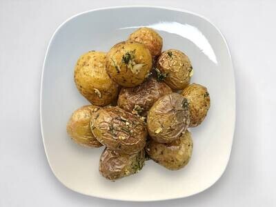 Baked Potatoes With Garlic / Lb.