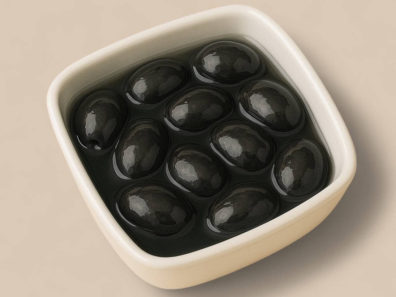 Jumbo Black pitred Olives / Lb.