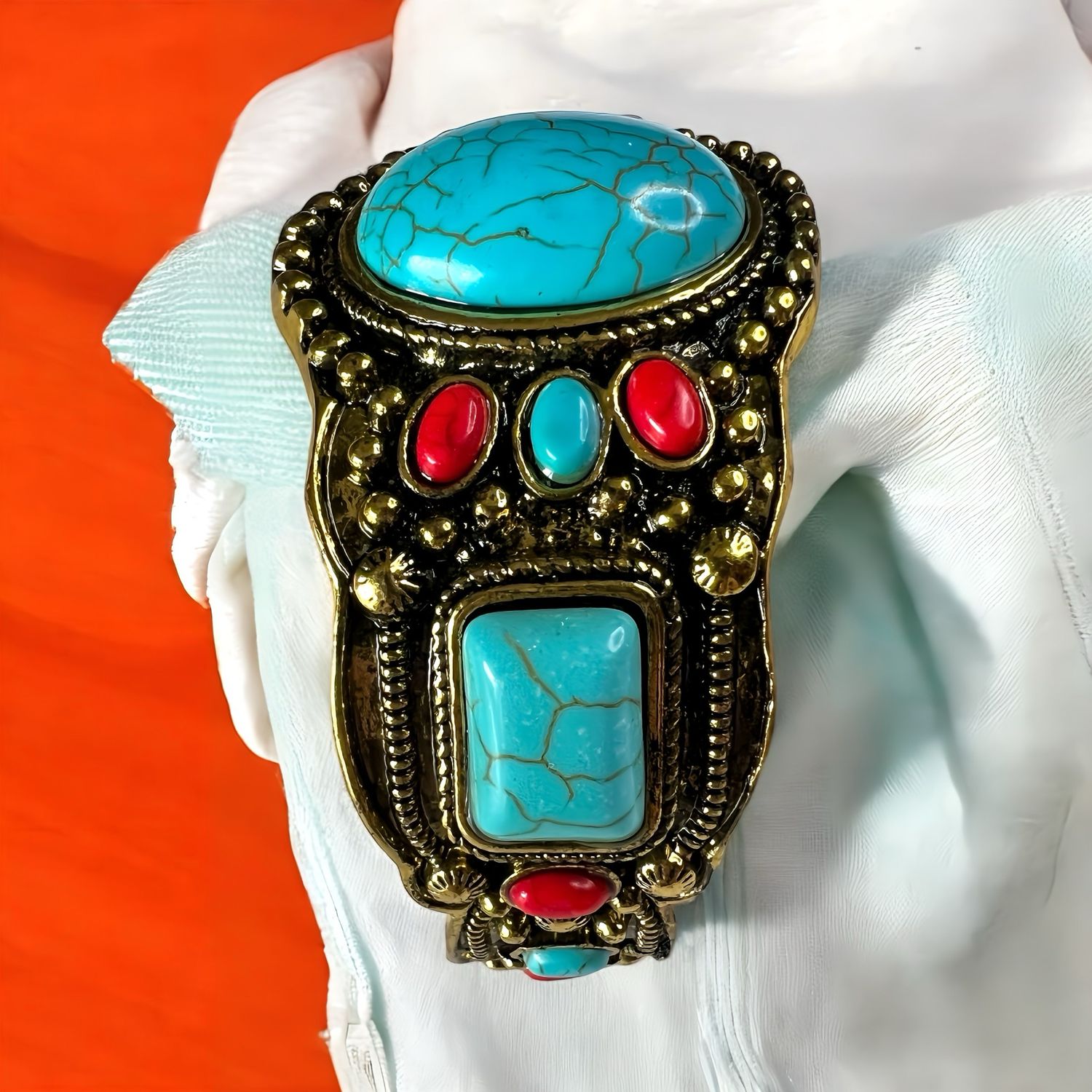 GREEN BRASS AND CORAL BANGLE